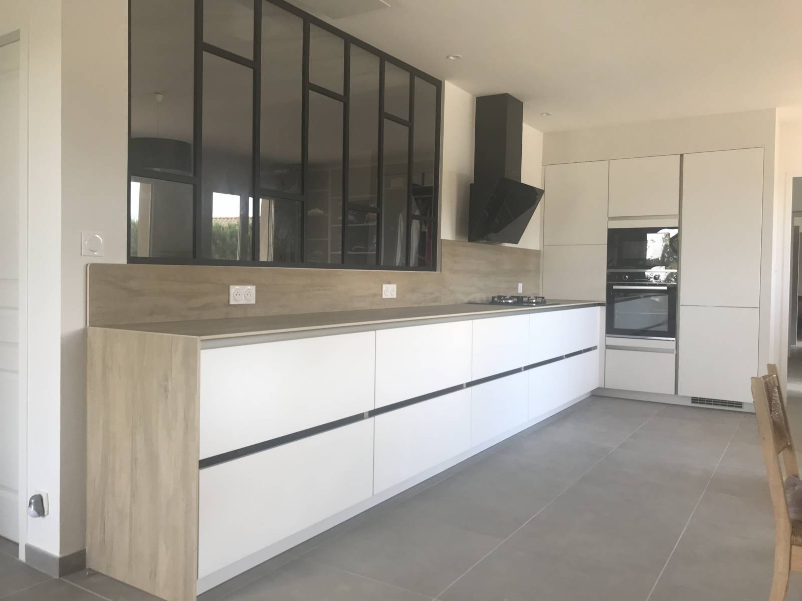 Verrière cuisine et séjour pour un pavillon à Savignac