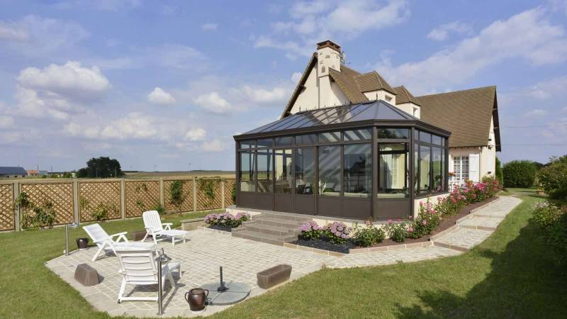 Achat et pose d'une véranda en aluminium avec volet roulant intégré à Bazas.